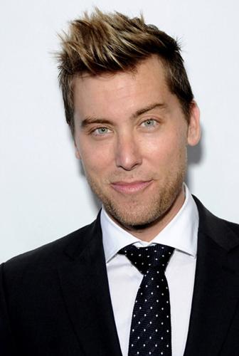 Man in suit and with a frosted hairstyle is the epitome of the 90s