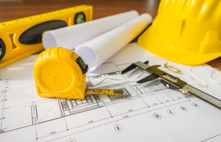 Renovation materials, including a tape measure, to ensure you don't make common mistakes