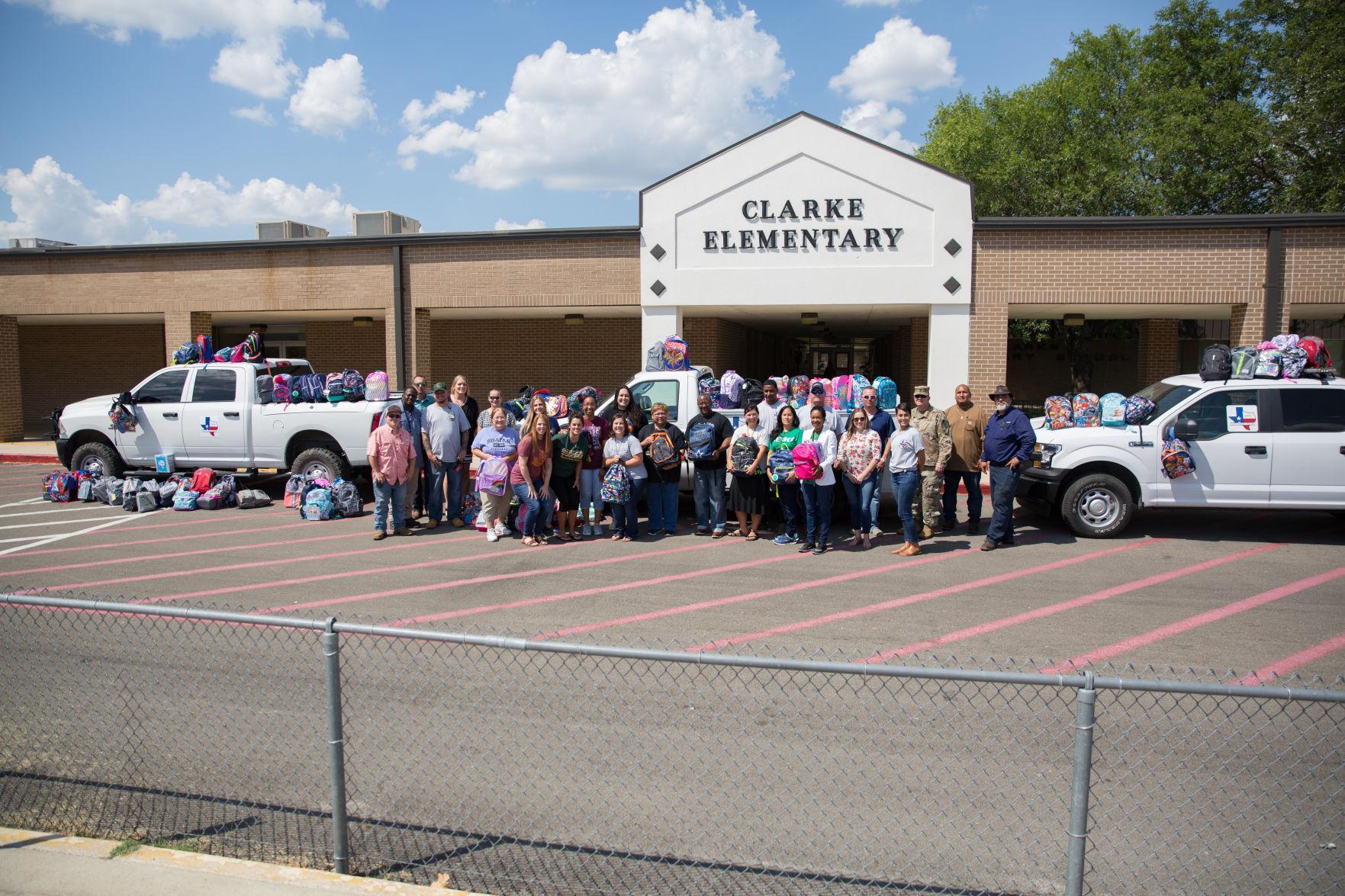 DPW donates backpacks to Clarke Elementary Living