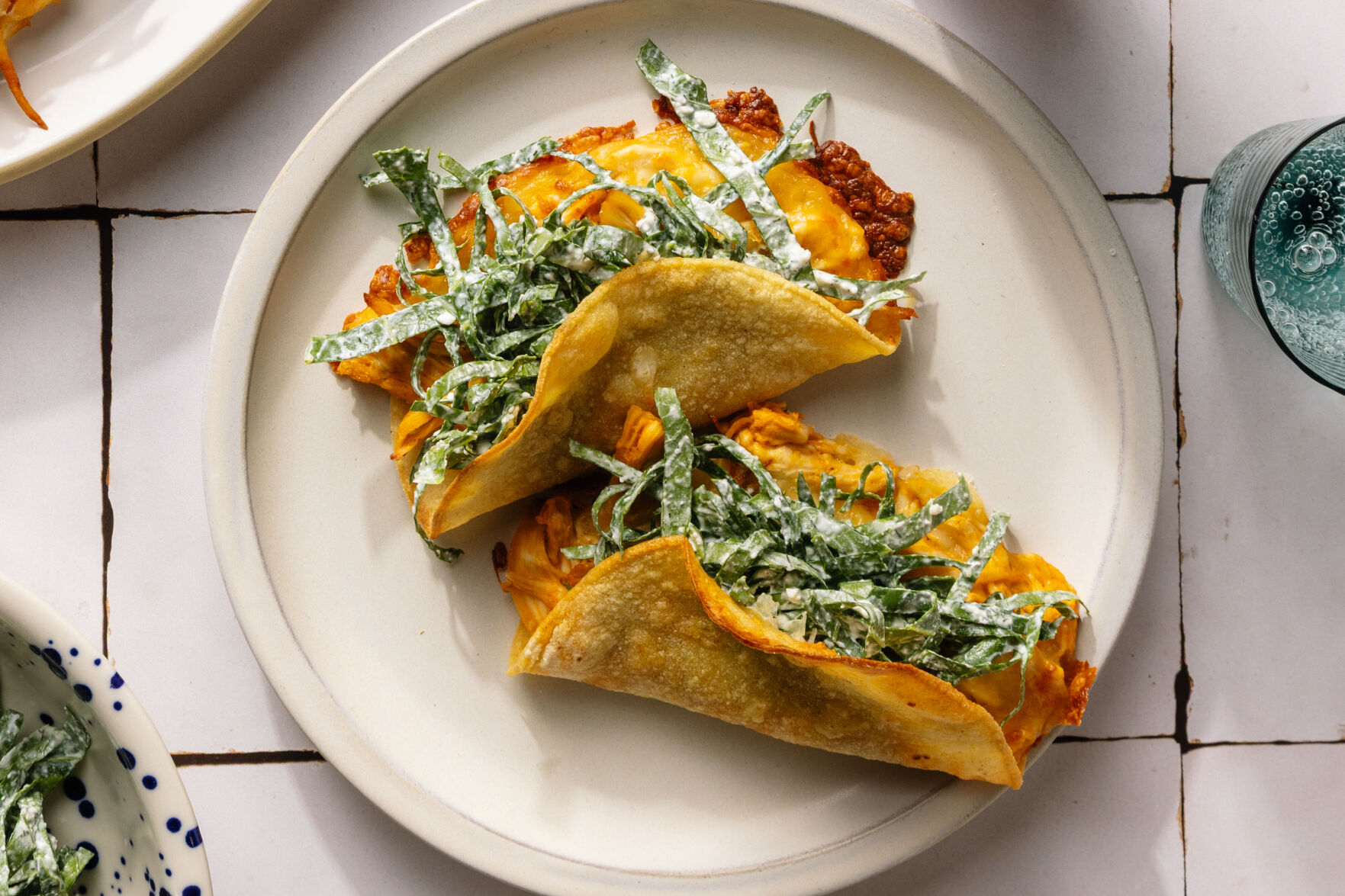How to make crispy Buffalo chicken tacos with collard slaw and a
