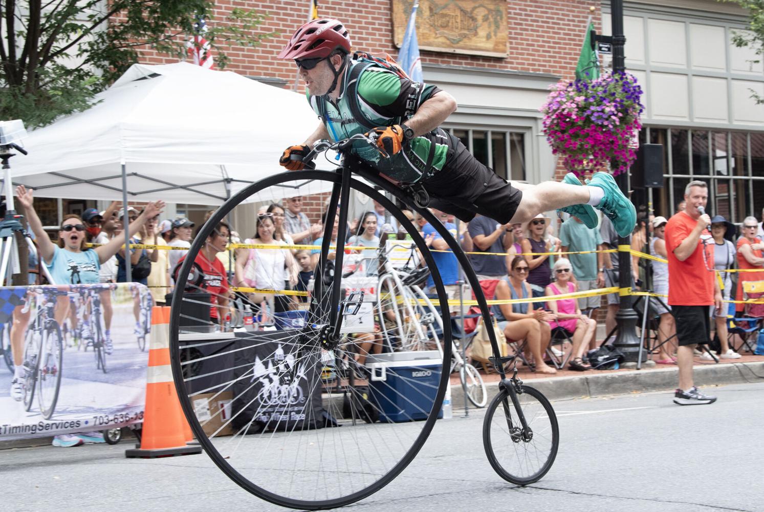 Cotton Wheel Racers Thousands line downtown streets as high wheel racers fly past | Tourism ...