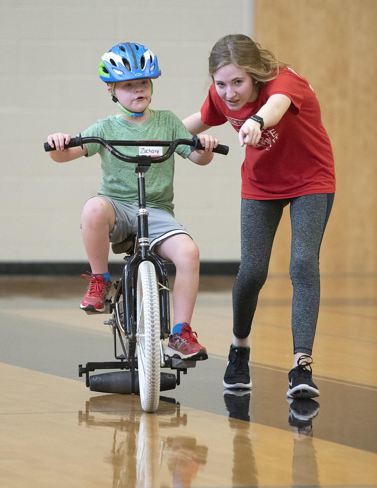 Adaptive camp makes bike riding accessible to children with