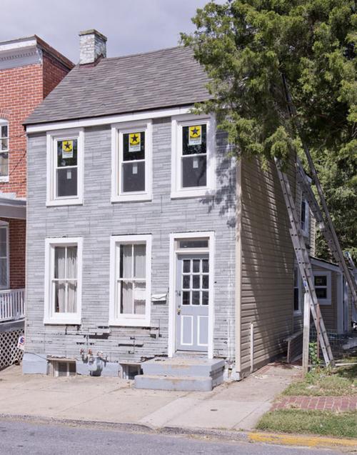 Repairs start on blighted buildings in city