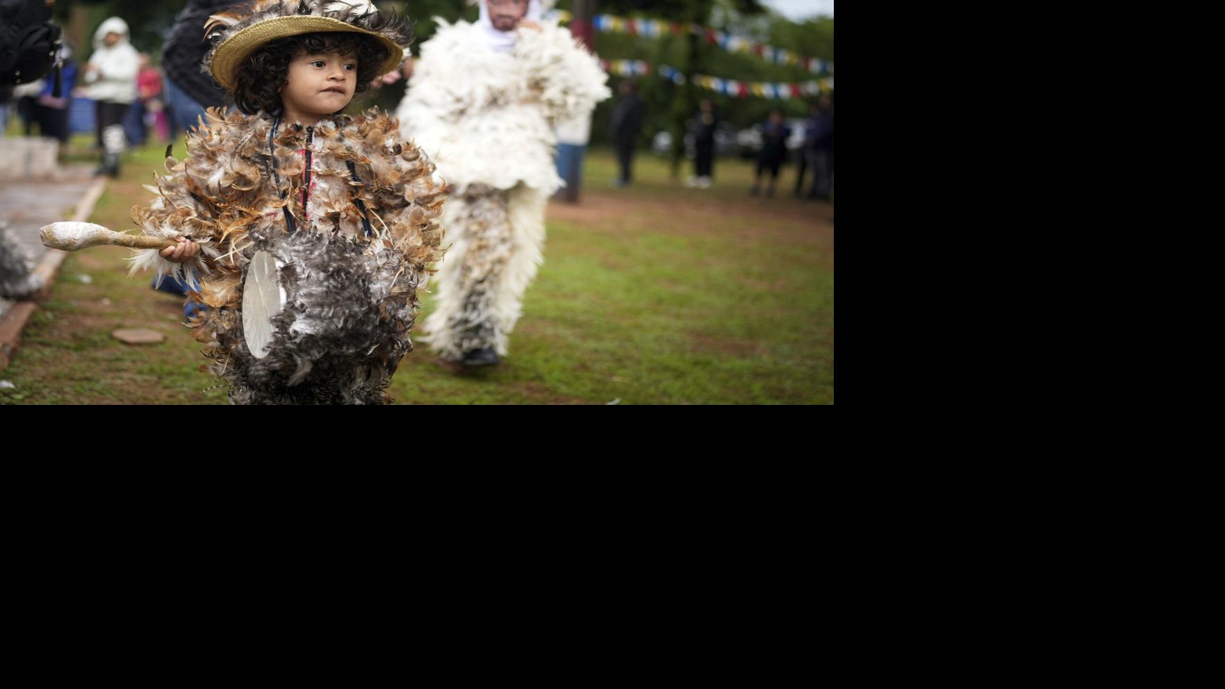 Despite rainy weather, Catholics in a Paraguayan town dress as birds to  honor their patron saint | Lifestyle | fredericknewspost.com