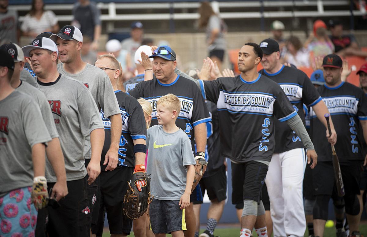 Guns best Hoses in annual charity softball game Crime & justice