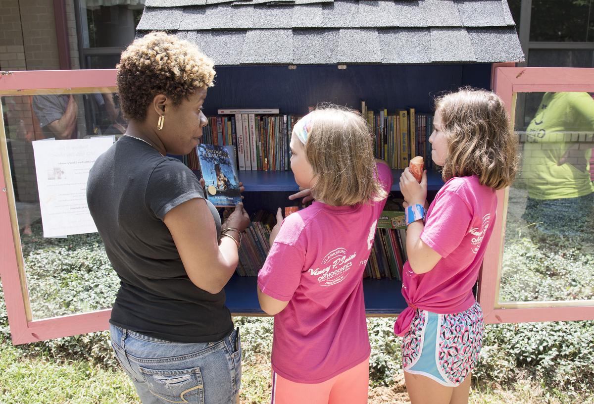 Girls on the Run club builds little free library for Ballenger Creek