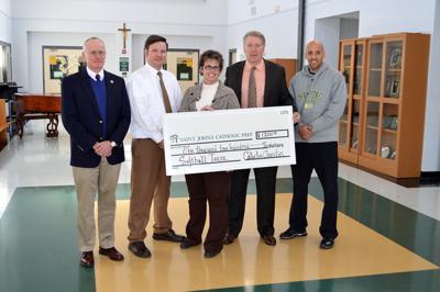 Bike ride benefits softball team