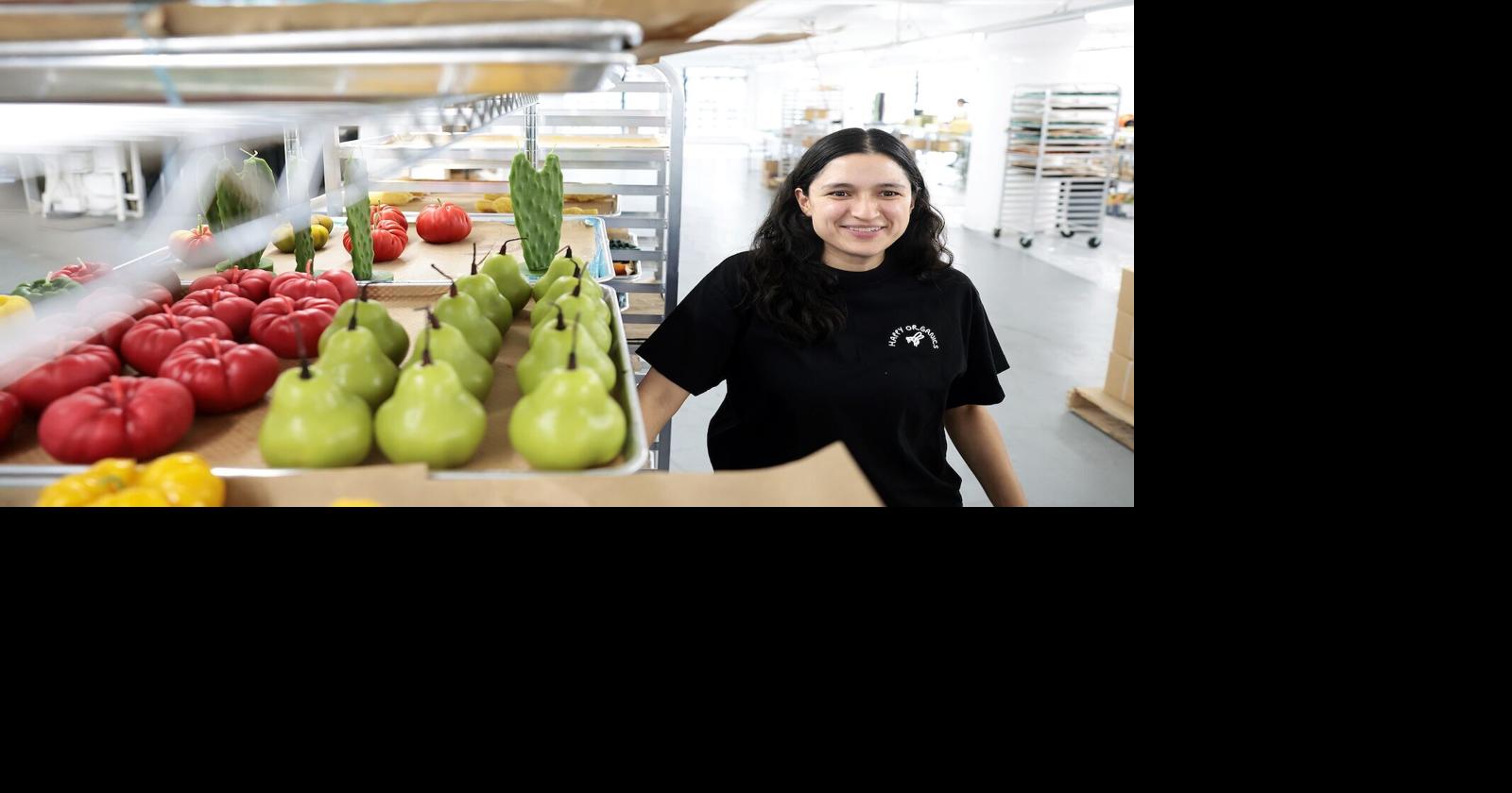Wait, it's a candle? Her beeswax fruit and veggie ones look so real, you'll want to take a bite
