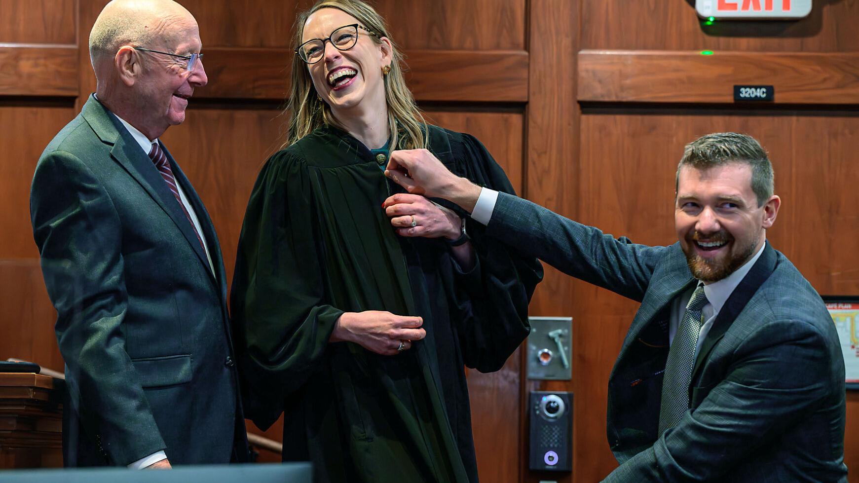 Former domestic violence prosecutor takes seat as new district court