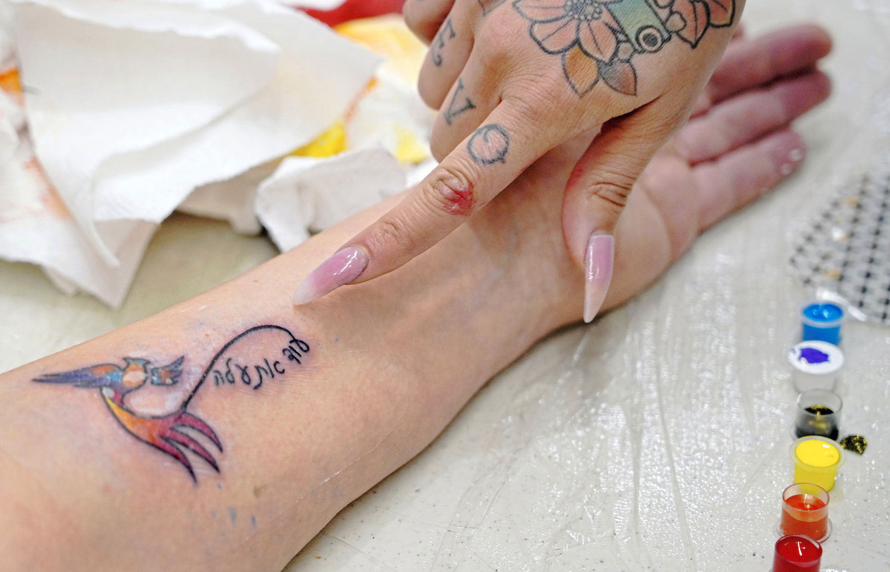 Lady Gaga's Powerful Survivor Tattoo: The Meaning Behind It