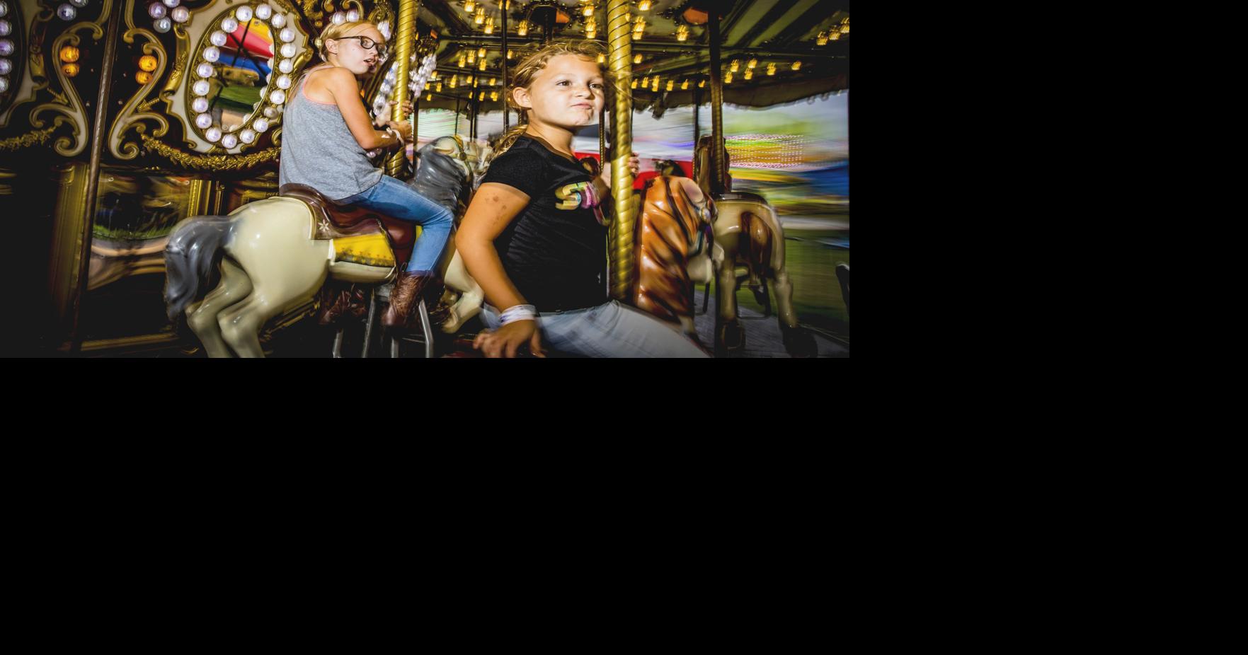 Fairgrounds in the foreground: Our photographer hops on the rides ...