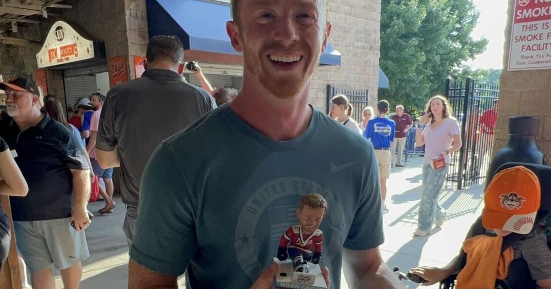 Smiles all around for Noah Grove — and his bobblehead — at Keys' annual hockey night