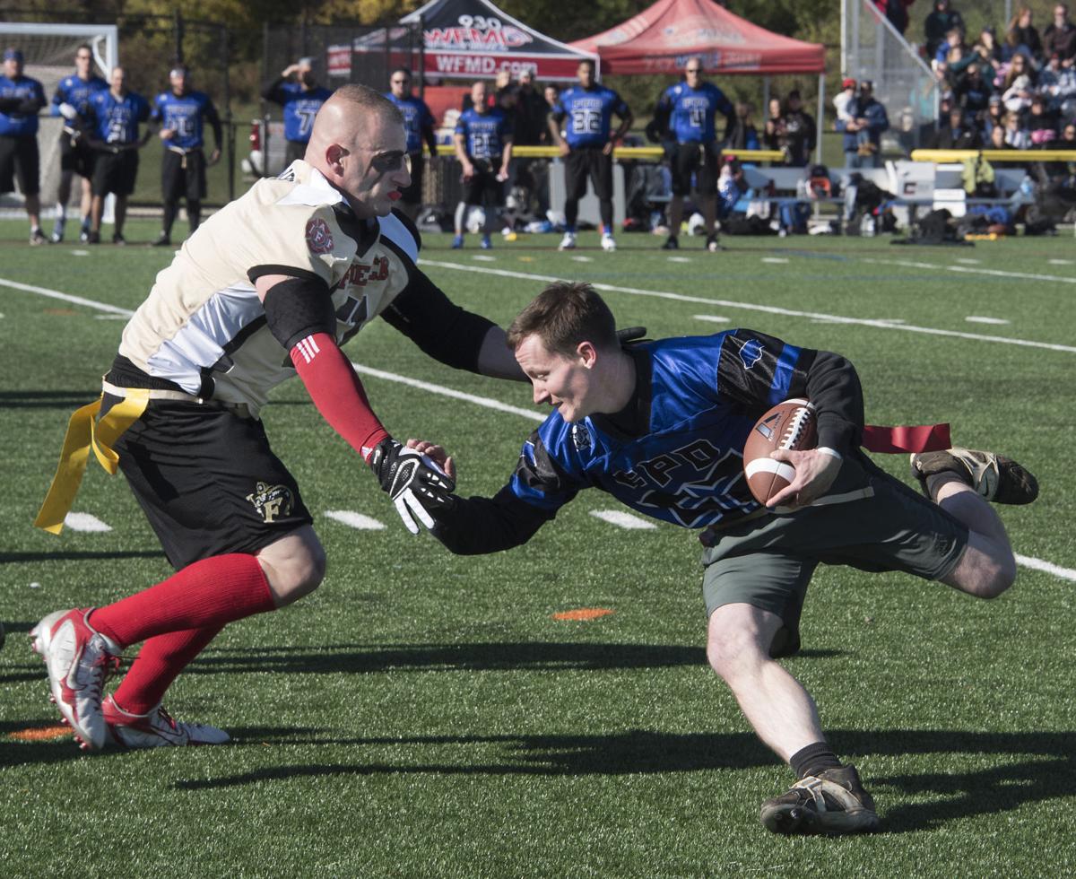 Frederick police, firefighters face off in fundraiser flag ...