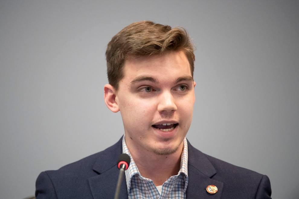 Unhappy with amendments, Carter withdraws backyard chicken bill