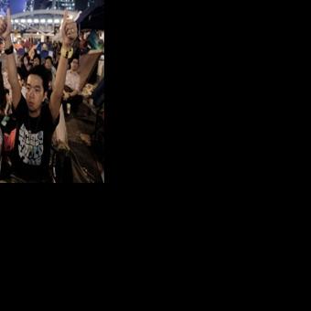 Hong Kong students dissolve pro-democracy group under 'severe' pressure