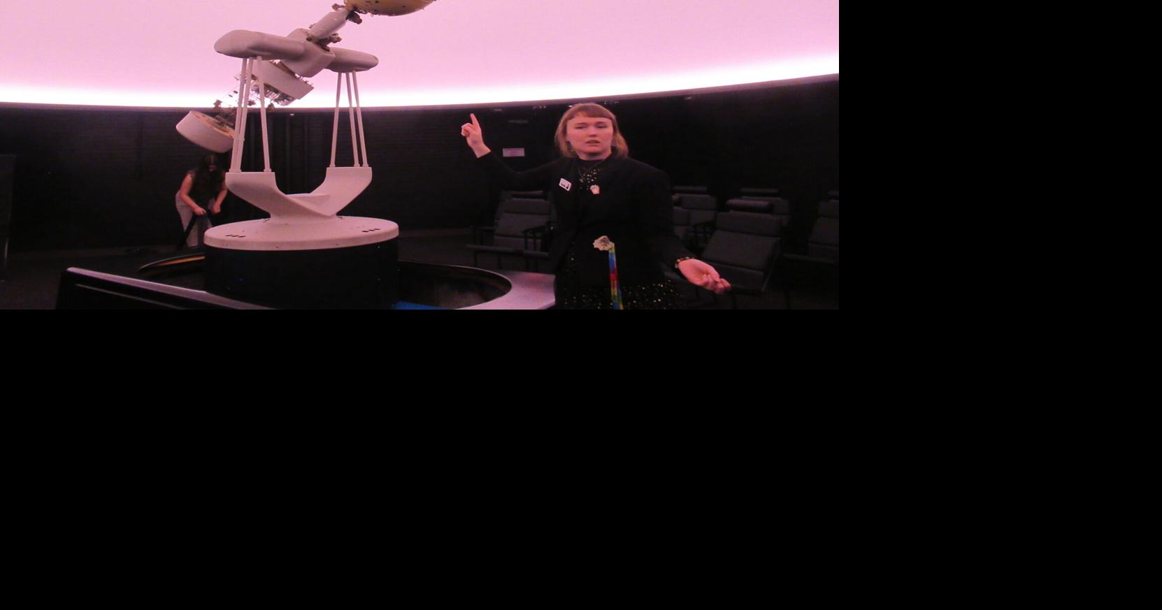 IMG_7406 Sarah Vise points to the starball in The Planetarium as she explains its features.JPG