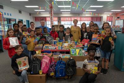 COMPeers donate supplies to Hitchcock schools