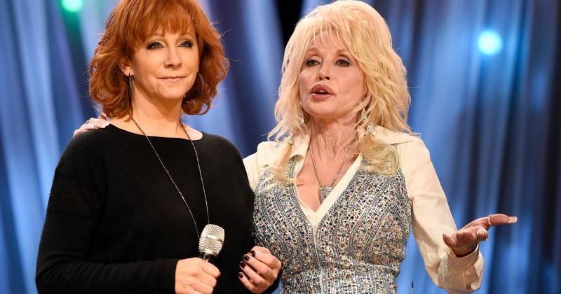 Reba McEntire and Dolly Parton chat at the telethon for “Dolly Parton’s Smoky Mountains Rise: A Benefit for the My People Fund