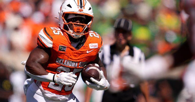 Oklahoma State's Ayo Adeyi (25) rushes second half of the college football game between the Oklahoma State Cowboys and the