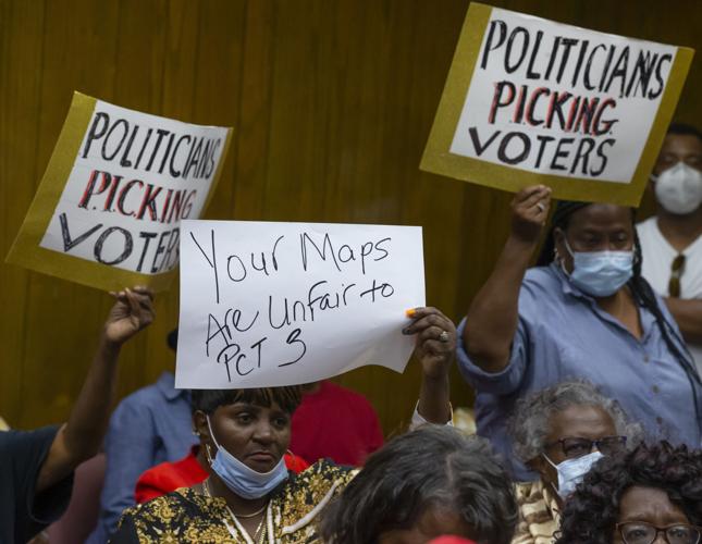 Galveston County commissioners OK redistricting map despite protest