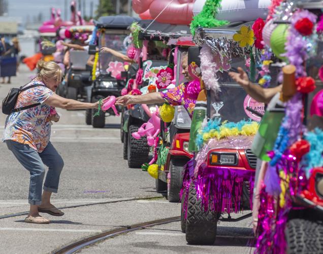 ‘Flamingos’ flock to downtown Galveston for annual parade Local News