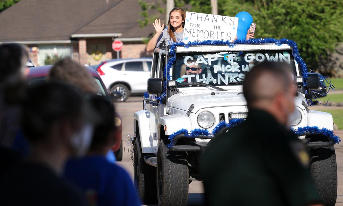Dickinson seniors pick up caps and gowns