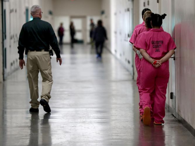 Galveston County Sheriff changes inmate uniforms to pink Local News