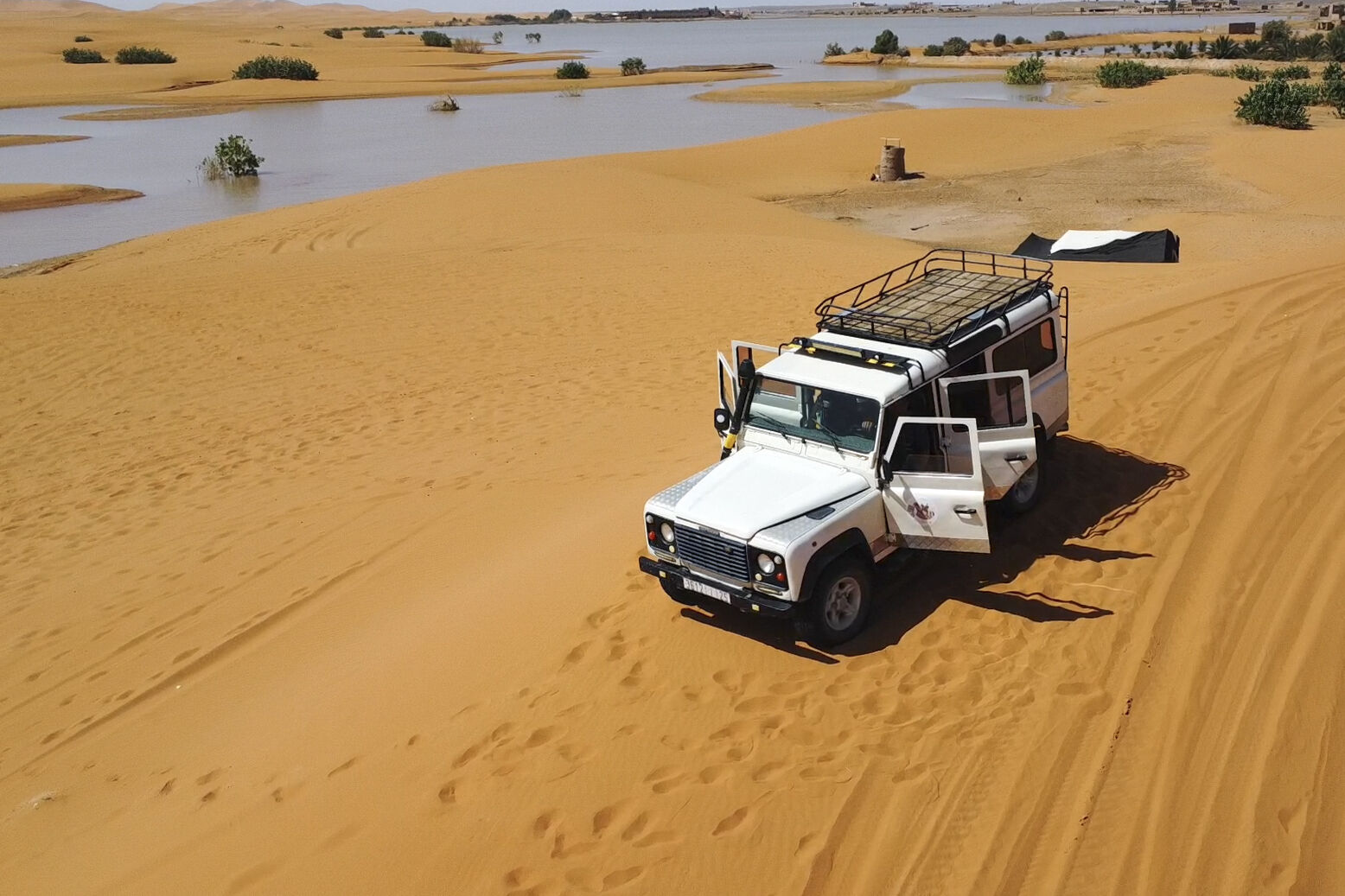 Water Gushes Through Sand Dunes After A Rare Rainfall In The Sahara ...