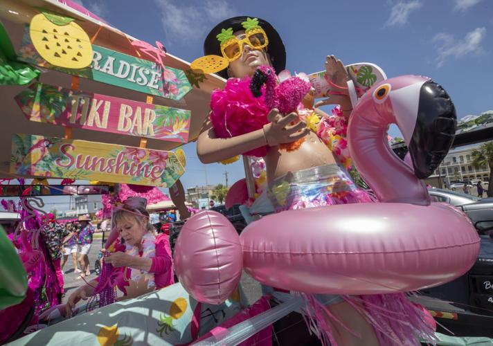 ‘Flamingos’ flock to downtown Galveston for annual parade Local News