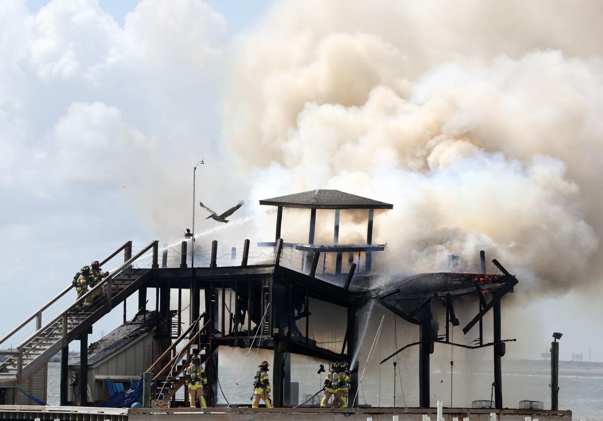 Galveston, Jamaica Beach battle fires in bay Local News The Daily News