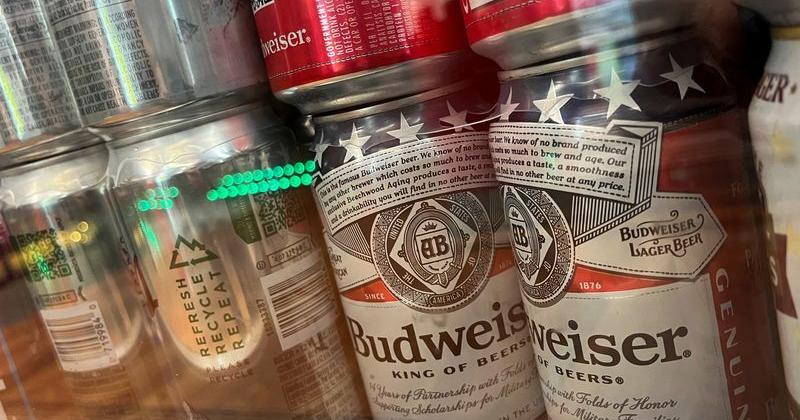 Cans of Budweiser brand beer are pictured at a liquor store in Washington