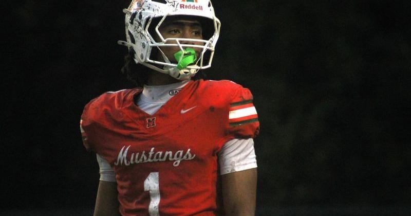 Mandarin receiver Brysen Wright (1) looks to the sideline for a signal during a high school football game against Fletcher on Oct. 10, 2025. [Clayton Freeman/Florida Times-Union]