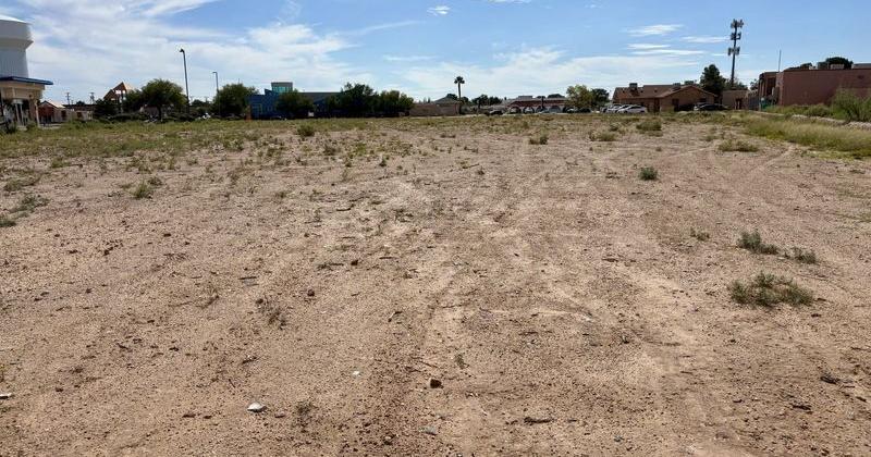 A vacant lot marks the future home of a new Spectrum telecommunications hub on Estrada Drive in East El Paso.