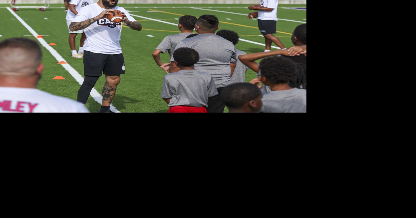 Football camp a humbling return to roots for NFL vet