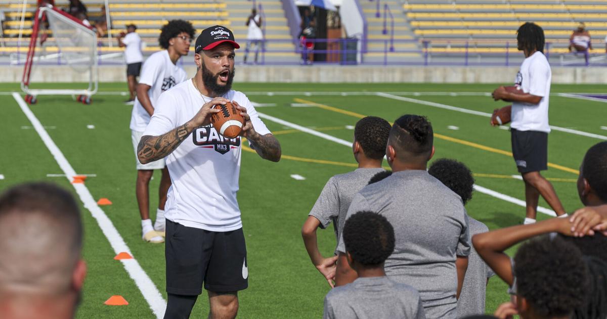 Mike Evans builds youth character and dreams with each handoff
