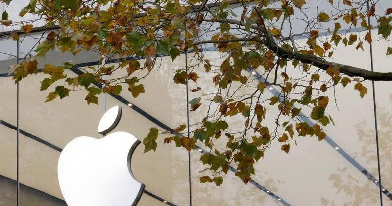The Apple Inc logo is seen at the entrance to the Apple store, in Brussels