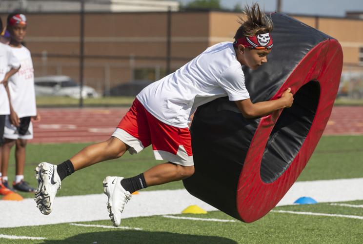 I see them, I see myself': NFL star returns to hometown for annual youth  camp, Local Sports