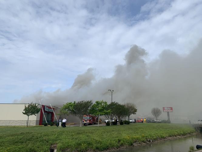 Texas City Firefighters working to put out hot spots after large fire