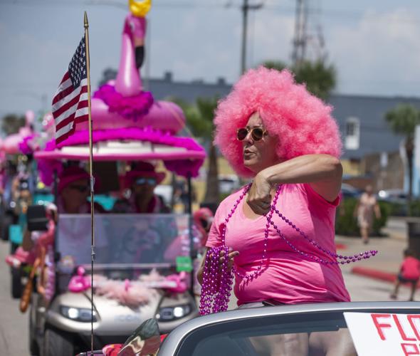 Pink paraders pound the pavement on Postoffice in Galveston Local