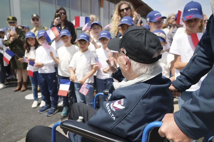 French children hail DDay veterans as heroes as they arrive in