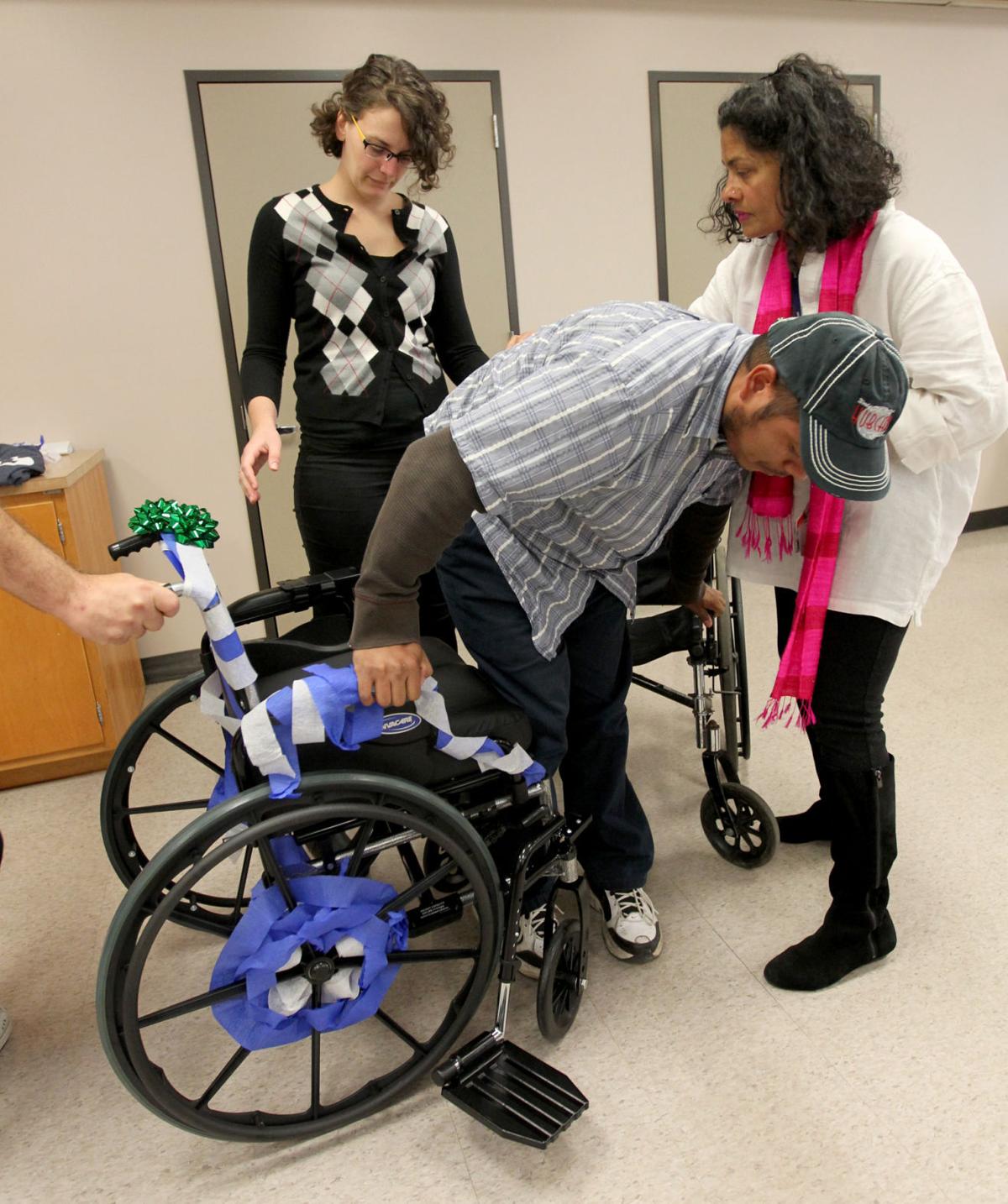 Occupational Therapy students surprise client with new wheelchair for