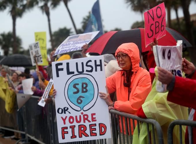 "Indivisible Galveston" rally draws people from as far away as Clear