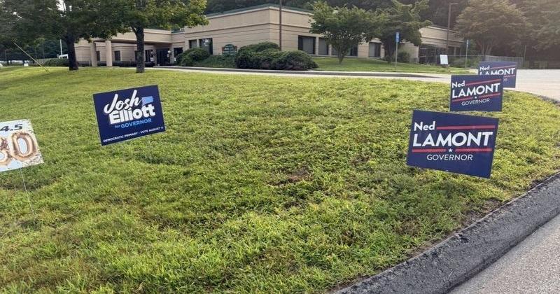 Campaign signs for Josh Elliott and Ned Lamont by the Rose City Senior Center.