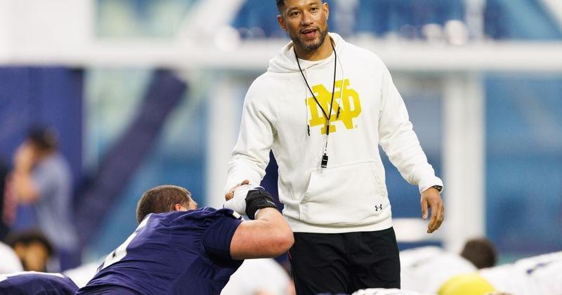 Head coach Marcus Freeman greets his players during a Notre Dame football practice at Irish Athletic Center on Friday, March 20, 2026, in South Bend.