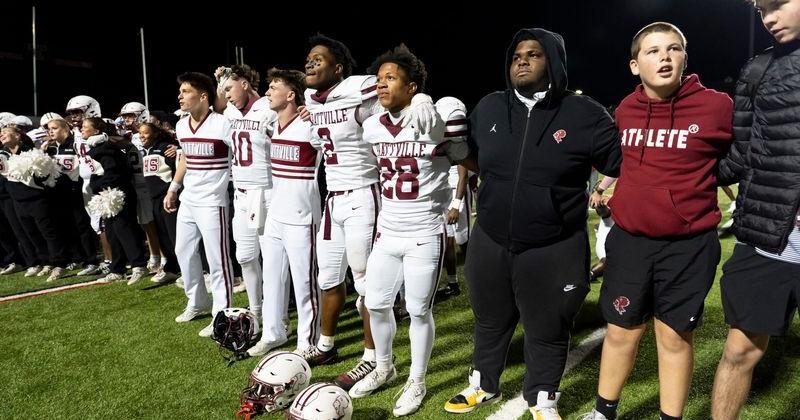 Prattville players listen to the school song as Thompson takes on Prattville football at Thompson High School in Alabaster, Ala. on Friday, Oct. 16, 2026. Prattville defeated Thompson 28-27.