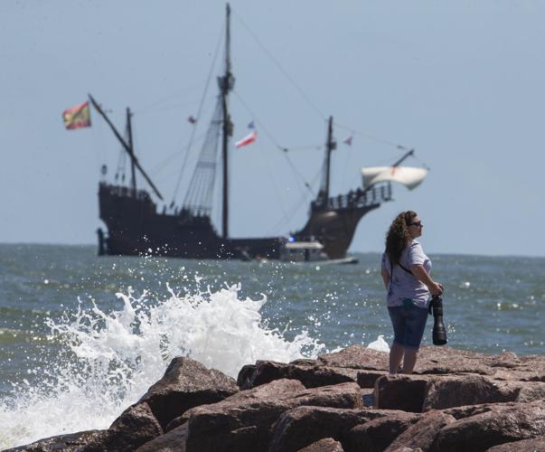 Hundreds gather on Galveston's seawall to view tall ships parade by