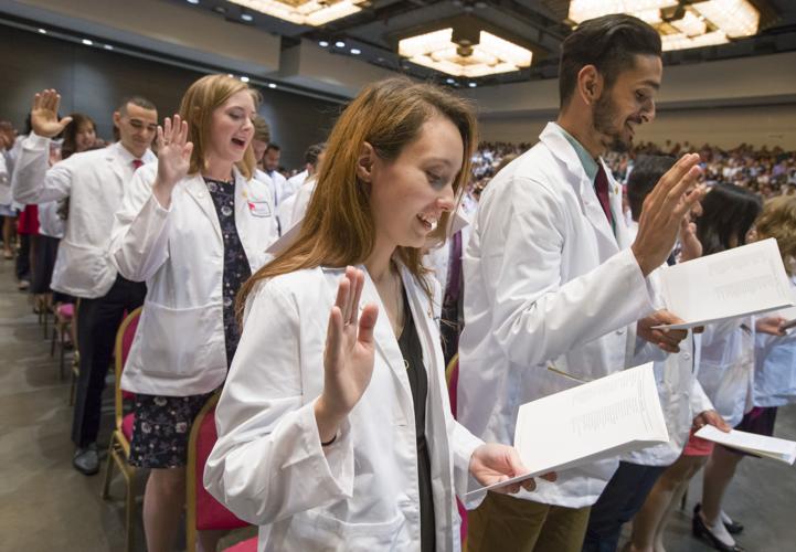 230 new medical students don white coats Local News The Daily News
