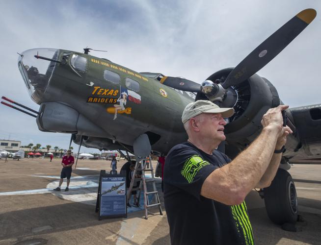 Vintage warbirds line the tarmac at first Moody Gardens Air, Car & Boat