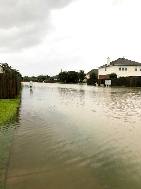 Houses flood, water rescues under way across Galveston County