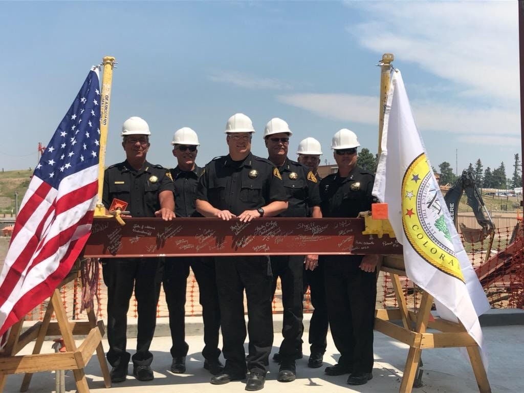 Teller sheriffs, county leaders celebrate new sheriff's office building with beam topping ceremony